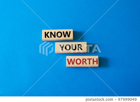 Know your worth symbol. Wooden blocks with words Know your worth. Beautiful blue background. Business and Know your worth concept. Copy space. 97999049