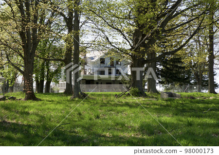 KEWADIN, MICHIGAN, UNITED STATES - MAY 16, 2018: Abandoned property of a summer camp at Maplehurst Lake in North Michigan 98000173
