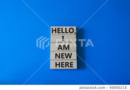 Hello I am new here symbol. Concept words Hello I am new here on wooden blocks. Beautiful white background. Business and Hello I am new here concept. Copy space. 98000218