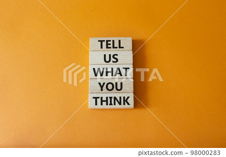 Tell us what you think symbol. Wooden blocks with words Tell us what you think. Beautiful orange background. Business and Tell us what you think concept. Copy space. Tell us what you think symbol. Wooden blocks with words Tell us what you think. Beautiful orange background. Business and Tell us what you think concept. Copy space. 98000283