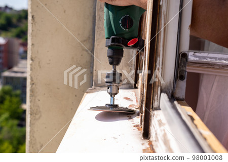 Sanding rust from an old window cill Sanding rust from an old window cill 98001008