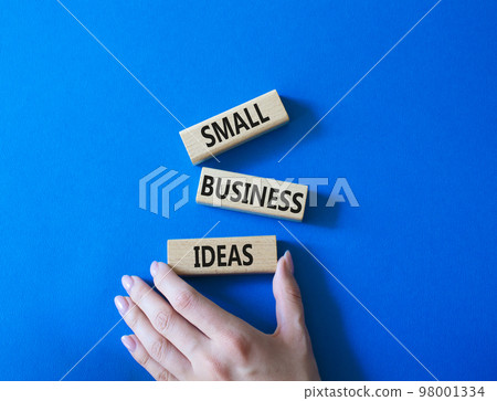 Small Business Ideas symbol. Wooden blocks with words Small Business Ideas. Businessman hand. Beautiful blue background. Business and Small Business Ideas concept. Copy space. Small Business Ideas symbol. Wooden blocks with words Small Business Ideas. Businessman hand. Beautiful blue background. Business and Small Business Ideas concept. Copy space. 98001334