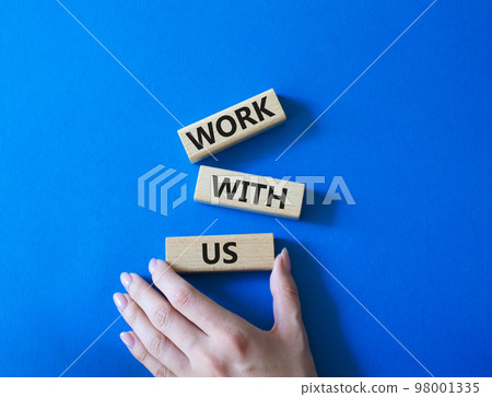 Work with us symbol. Wooden blocks with words Work with us. Businessman hand. Beautiful blue background. Business and Work with us concept. Copy space. Work with us symbol. Wooden blocks with words Work with us. Businessman hand. Beautiful blue background. Business and Work with us concept. Copy space. 98001335
