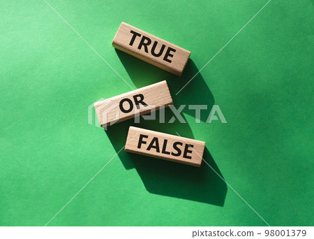 True or false symbol. Wooden blocks with words True or false. Beautiful green background. Businessman hand. Business concept and True or false. Copy space. True or false symbol. Wooden blocks with words True or false. Beautiful green background. Businessman hand. Business concept and True or false. Copy space. 98001379