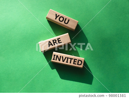 You are invited symbol. Wooden blocks with words You are invited. Beautiful green background. Business and You are invited concept. Copy space. You are invited symbol. Wooden blocks with words You are invited. Beautiful green background. Business and You are invited concept. Copy space. 98001381