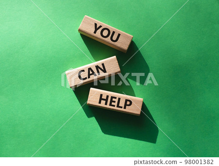 You can help symbol. Wooden blocks with words You can help. Beautiful green background. Business and You can help concept. Copy space. You can help symbol. Wooden blocks with words You can help. Beautiful green background. Business and You can help concept. Copy space. 98001382