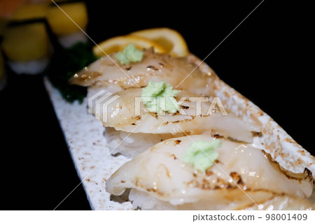 sushi or engawa sushi or fish sushi, rice topped with engawa or fish rolls 98001409