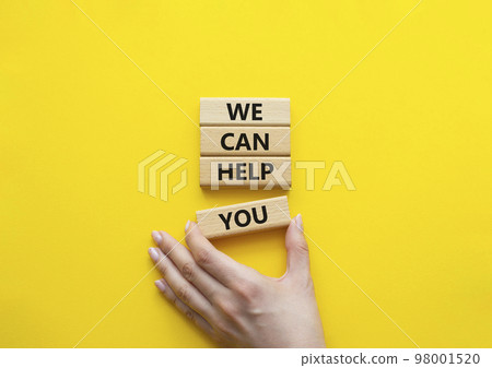 We can help you symbol. Concept words We can help you on wooden blocks. Beautiful yellow background. Businessman hand. Business and We can help you concept. Copy space We can help you symbol. Concept words We can help you on wooden blocks. Beautiful yellow background. Businessman hand. Business and We can help you concept. Copy space 98001520