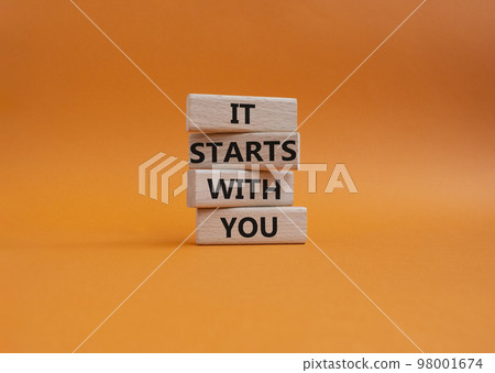 It starts with you symbol. Wooden blocks with words It starts with you. Beautiful orange background. Business and It starts with you concept. Copy space. It starts with you symbol. Wooden blocks with words It starts with you. Beautiful orange background. Business and It starts with you concept. Copy space. 98001674