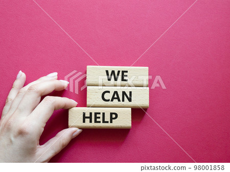 We can help symbol. Wooden blocks with words We can help. Beautiful red background. Businessman hand. Business and We can help concept. Copy space. 98001858