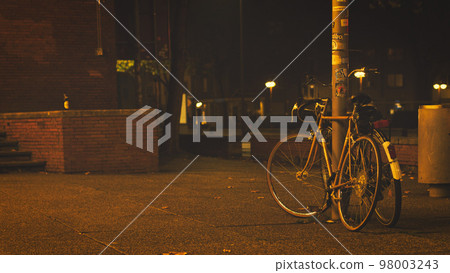 Old bicycles in lantern light in front of the Bochum Schauspielhaus, Germany Old bicycles in lantern light in front of the Bochum Schauspielhaus, Germany 98003243