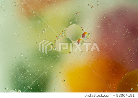 Abstract gradient blurred background in green yellow and orange colors 98004191
