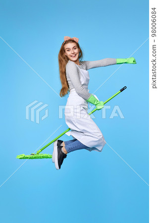 woman in rubber gloves and cleaner apron washing floor with mop woman in rubber gloves and cleaner apron washing floor with mop 98006084