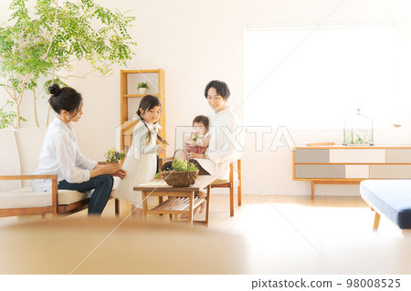family relaxing at home 98008525
