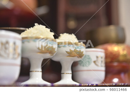 Buddhist altar rice and tea 98011466