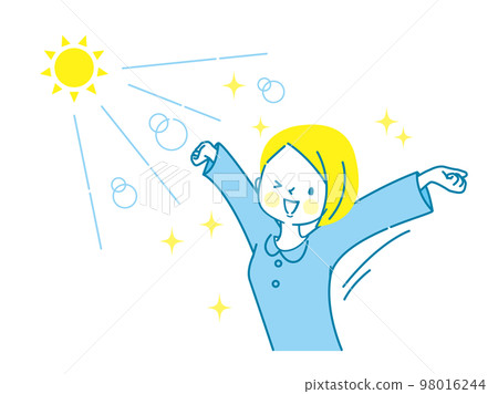 Young woman stretching in the sun 98016244