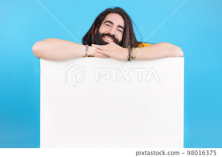 Smiley man holding a board with blank space Smiley man holding a board with blank space 98016375
