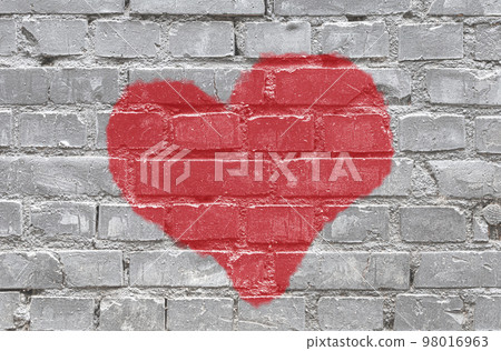 Red heart on Gray monochrome brick wall texture background. Old Brickwork 98016963