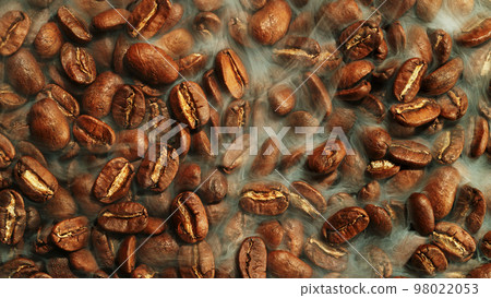 Coffee beans beying roasted, closeup. 98022053