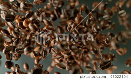Coffee beans flying in the air in freeze motion. 98022104