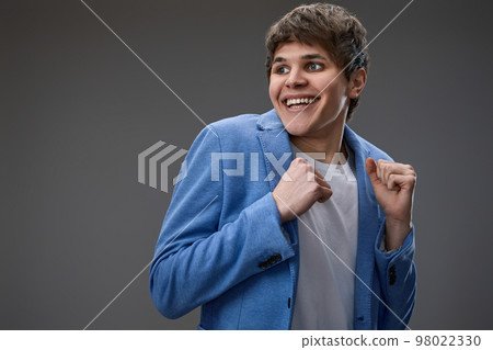 shocked man with surprise expression and excited face 98022330