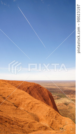 Contrail seen while climbing Ayers Rock (Uluru) 98023197