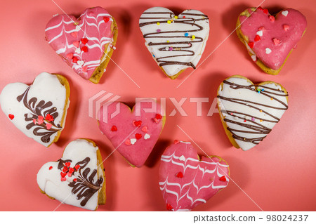 Heart shaped cookies on pink background. Top view. Dessert for Valentine day 98024237
