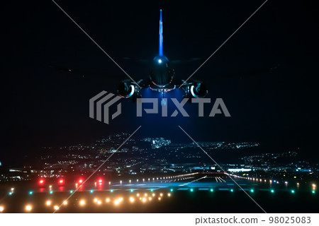 Beautiful airplane and runway night view landing at Osaka Itami Airport 98025083