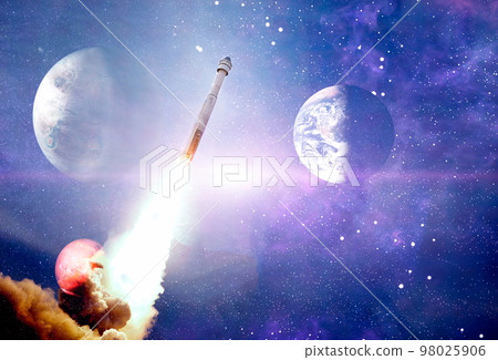Shuttle launch in the clouds to outer space. Dark space with stars on background.Spaceship flight. Elements of this image furnished by NASA 98025906