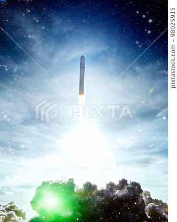 Shuttle launch in the clouds to outer space. Dark space with stars on background.Spaceship flight. Elements of this image furnished by NASA 98025915