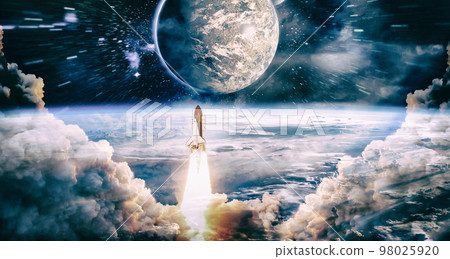Shuttle launch in the clouds to outer space. Dark space with stars on background.Spaceship flight. Elements of this image furnished by NASA Shuttle launch in the clouds to outer space. Dark space with stars on background.Spaceship flight. Elements of this image furnished by NASA 98025920