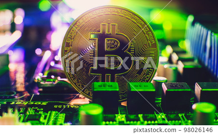 Bitcoin cryptocurrency new version on computer electronic circuit board background . Virtual cryptocurrency money Bitcoin golden 98026146