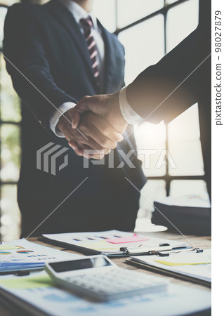 Business partnership meeting concept. Image businessmans handshake. Successful businessmen handshaking after good deal. Group support concept. Business partnership meeting concept. Image businessmans handshake. Successful businessmen handshaking after good deal. Group support concept. 98027879