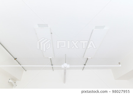 Electrical wires and pipes on house concrete ceiling background, plastic hoses with cables in empty room. Lines of pvc tubes, conduit after professional work. Renovation of home or factory interior Electrical wires and pipes on house concrete ceiling background, plastic hoses with cables in empty room. Lines of pvc tubes, conduit after professional work. Renovation of home or factory interior 98027955