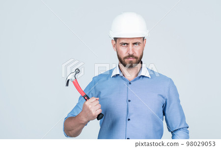 safety business. successful man in protective wear. entrepreneur in helmet safety business. successful man in protective wear. entrepreneur in helmet 98029053