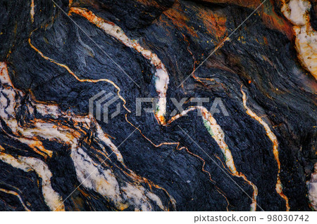 Rocky shapes on the beach. textures and patterns generated on the stones of the Asturian beaches Rocky shapes on the beach. textures and patterns generated on the stones of the Asturian beaches 98030742