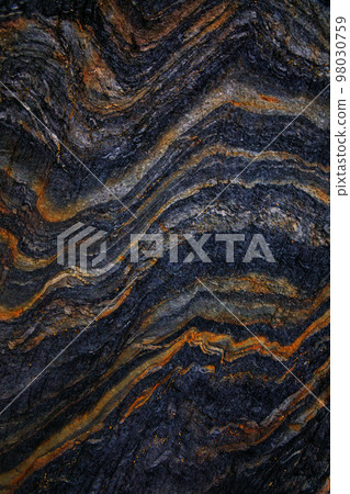 Rocky shapes on the beach. textures and patterns generated on the stones of the Asturian beaches 98030759