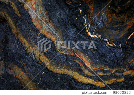 Rocky shapes on the beach. textures and patterns generated on the stones of the Asturian beaches 98030833