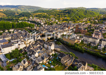Drone view of summer cityscape of Espalion on Lot river, France 98033315