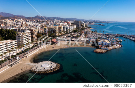 Aerial drone perspective of beautiful over luxury Puerto Banus Bay in Marbella. Spain Aerial drone perspective of beautiful over luxury Puerto Banus Bay in Marbella. Spain 98033397