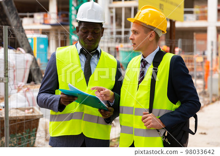 Two architects discussing construction project 98033642