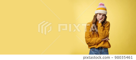Bored annoyed fed up cute girlfriend cannot stand boring talks leaning palm indifferent look camera under forehead uninterested not paying attention, standing bothered yellow background Bored annoyed fed up cute girlfriend cannot stand boring talks leaning palm indifferent look camera under forehead uninterested not paying attention, standing bothered yellow background 98035461