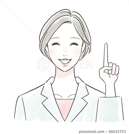 A woman in a white coat pointing with a smile 98035755