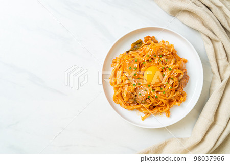 stir-fried udon noodles with kimchi and pork 98037966