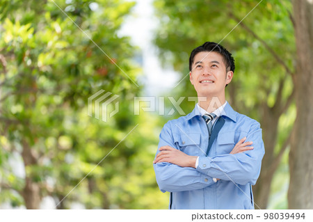 Business image A man in work clothes 98039494