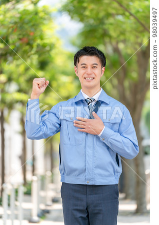 Business image Men in work clothes Guts pose 98039497