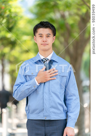 Business image A man in work clothes 98039499