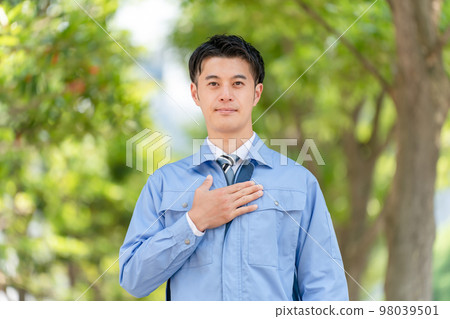 Business image A man in work clothes 98039501