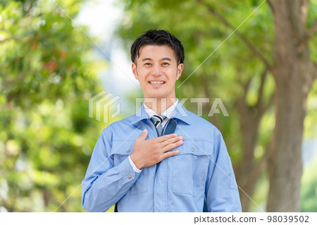 Business image A man in work clothes 98039502
