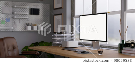 side view, Modern urban office desk with blank screen of computer mockup, office supplies and decor 98039588
